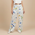 Damesbroek met wijde pijpen en bladprint hoge elastische taille Jelle Jora Mode