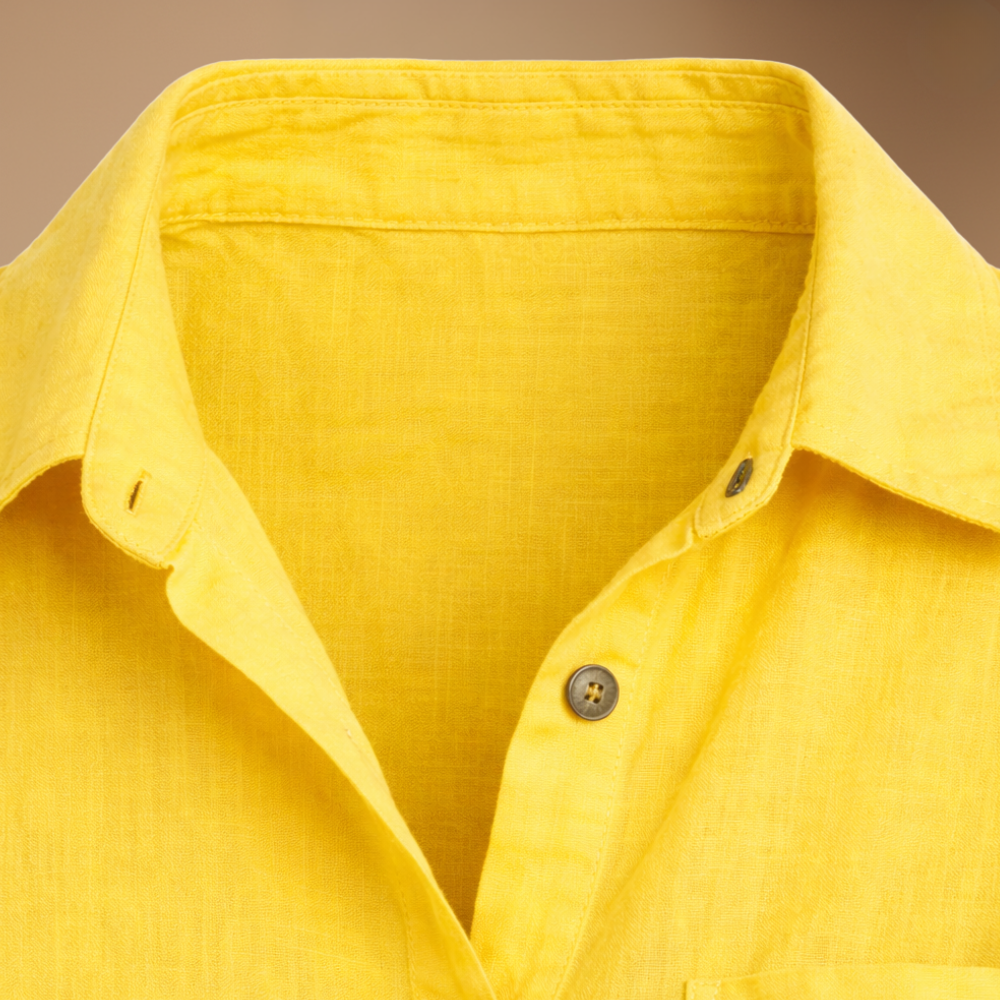 Vrouwenblouse met losse pasvorm mouwloos en met knopen Jelle Jora Mode