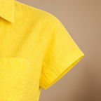 Vrouwenblouse met losse pasvorm mouwloos en met knopen Jelle Jora Mode