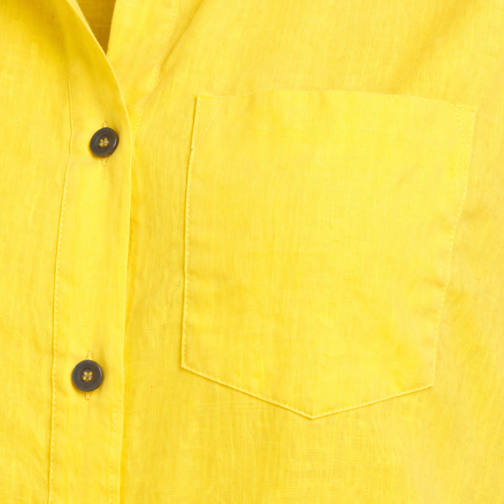 Vrouwenblouse met losse pasvorm mouwloos en met knopen Jelle Jora Mode