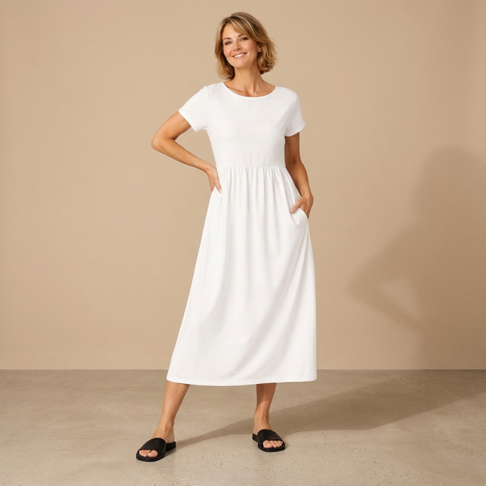 Dames casual midi jurk met ronde hals korte mouwen en zakken Jelle Jora Mode
