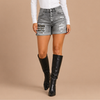 Damesjeansshort met omgeslagen zoom en versleten look Jelle Jora Mode