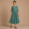 Dames midi-jurk met bloemenprint en halflange mouwen Jelle Jora Mode