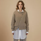 Effen gebreide cardigan met onregelmatige knoopsluiting Jelle Jora Mode