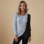 Contrasttrui met knopen en onregelmatige zoom Jelle Jora Mode