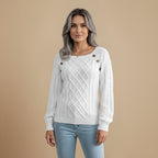 Kabelbrei trui met spijkerkralen Jelle Jora Mode