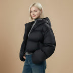 Damesjas met voering hoge taille en capuchon kort model Jelle Jora Mode