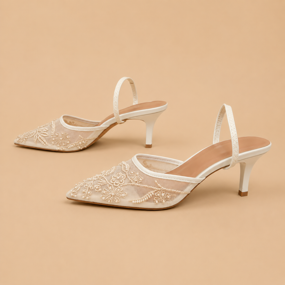 Dames geborduurde pumps met spitse neus en slingback Jelle Jora Mode
