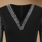 Dames elegante jumpsuit met V hals en mesh mouwen Jelle Jora Mode