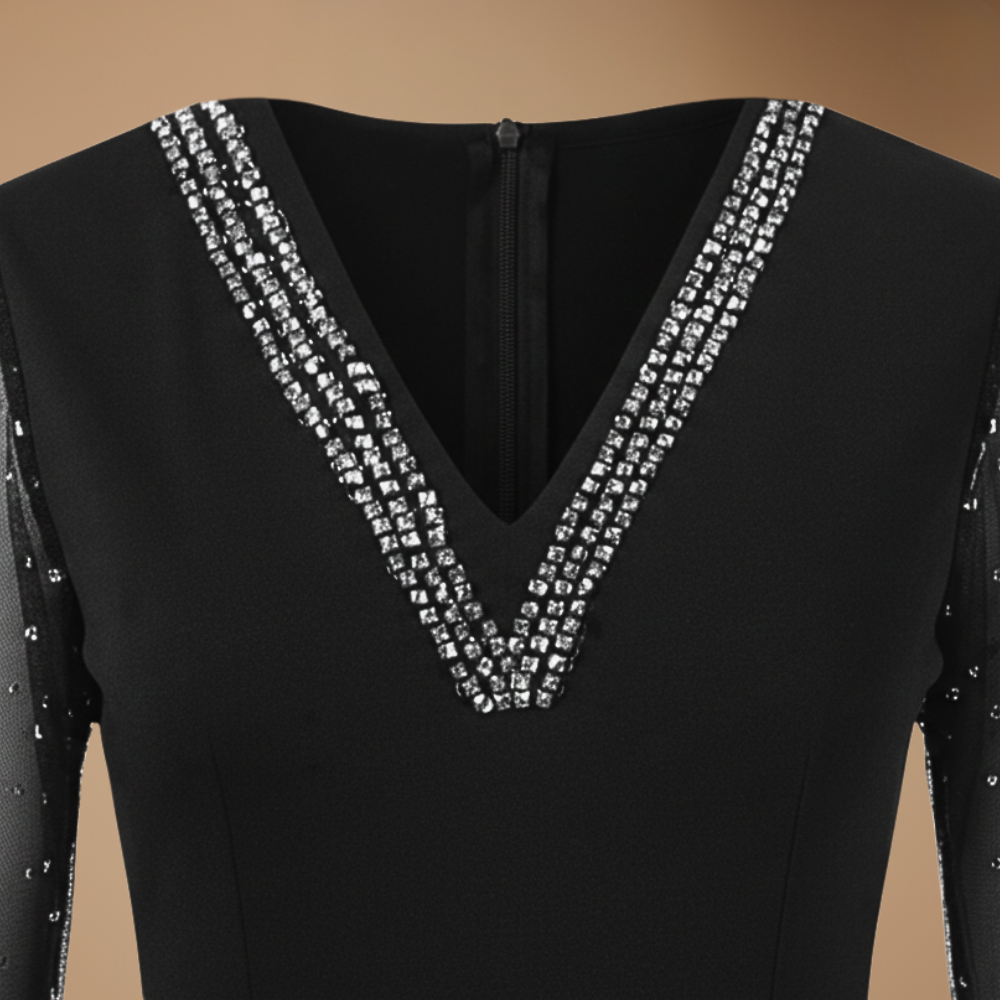 Dames elegante jumpsuit met V hals en mesh mouwen Jelle Jora Mode