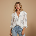 Damesblouse met lange mouwen en ruches aan de kraag