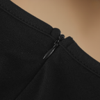 Dames elegante jumpsuit met V hals en mesh mouwen Jelle Jora Mode
