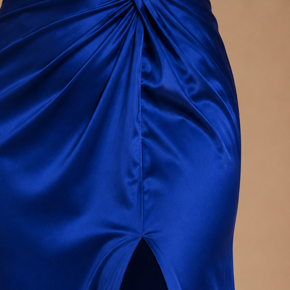 Dames maxi-jurk met één schouder en gedrapeerde details Jelle Jora Mode