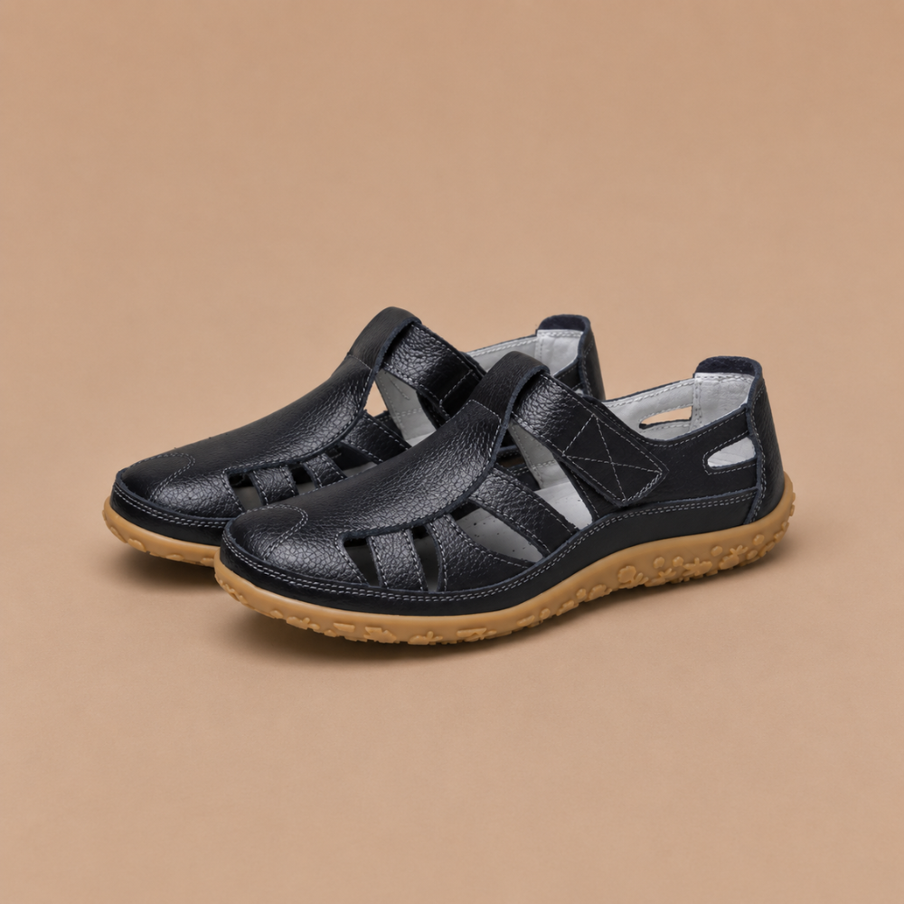 Dames platte strandsandalen met uitgesneden zool Jelle Jora Mode