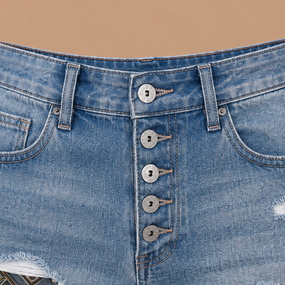 Damesjeansshort met omgeslagen zoom en versleten look Jelle Jora Mode