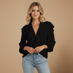 Damesblouse met lange mouwen en ruches aan de kraag