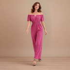 Dames off-shoulder jumpsuit met plooien en wijde pijpen Jelle Jora Mode