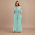 Dames off-shoulder jumpsuit met plooien en wijde pijpen Jelle Jora Mode